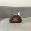 6930ac9e6e68136f4d9aced5 Celine New Logo Print Half-Moon Mini Bag