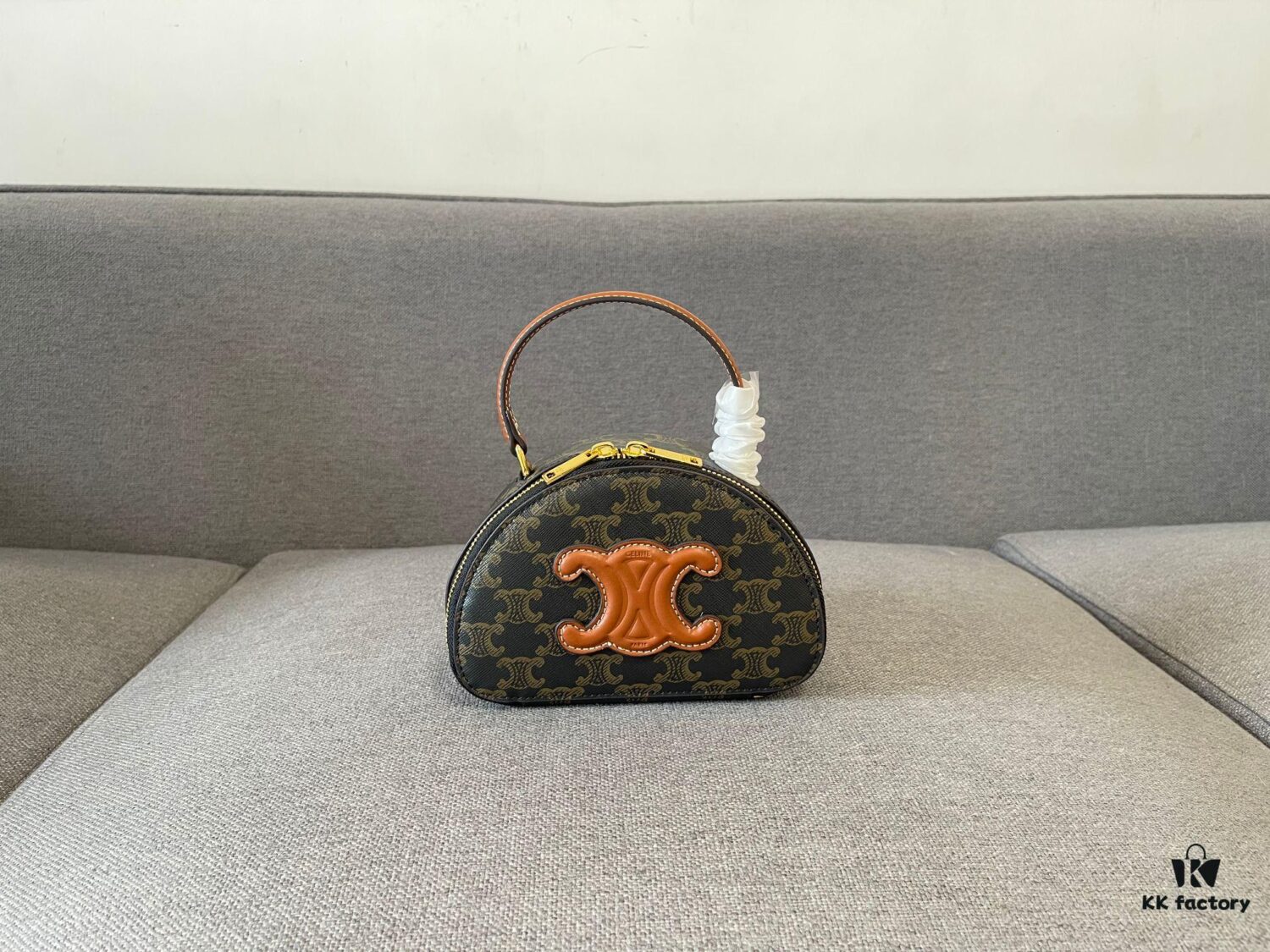 6930ac9e6e68136f4d9aced5 Celine New Logo Print Half-Moon Mini Bag
