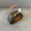 6930aca16e68136f4d9aceda Celine New Logo Print Half-Moon Mini Bag