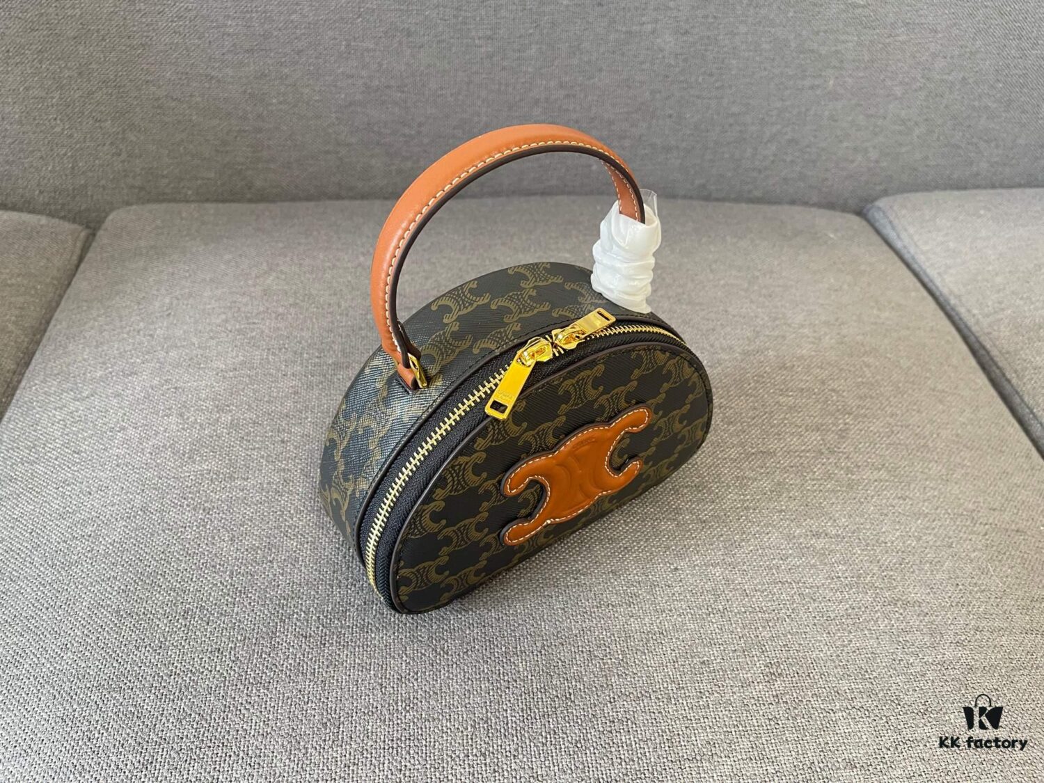 6930aca16e68136f4d9aceda Celine New Logo Print Half-Moon Mini Bag