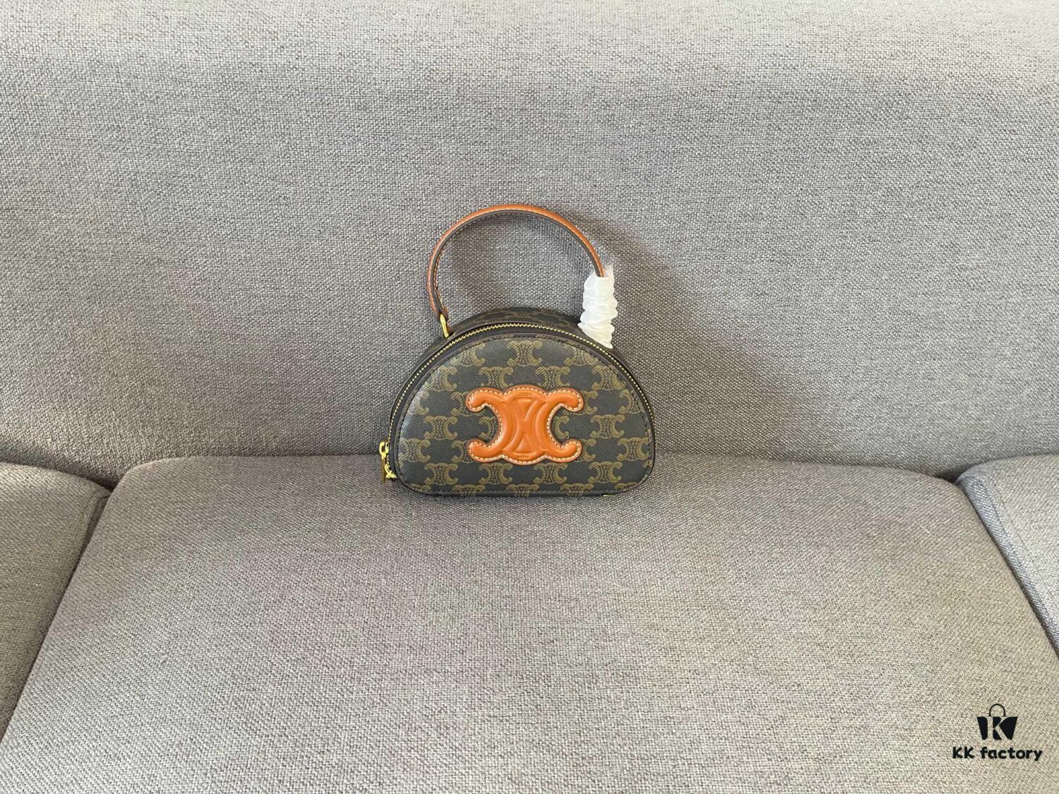 6930aca16e68136f4d9acedb Celine New Logo Print Half-Moon Mini Bag
