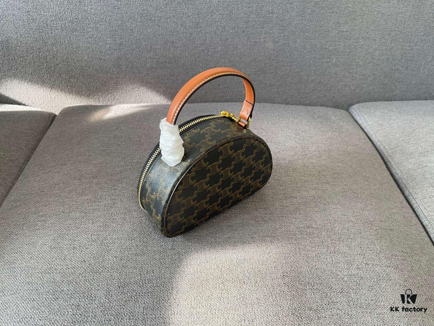 6930aca16e68136f4d9acedc Celine New Logo Print Half-Moon Mini Bag