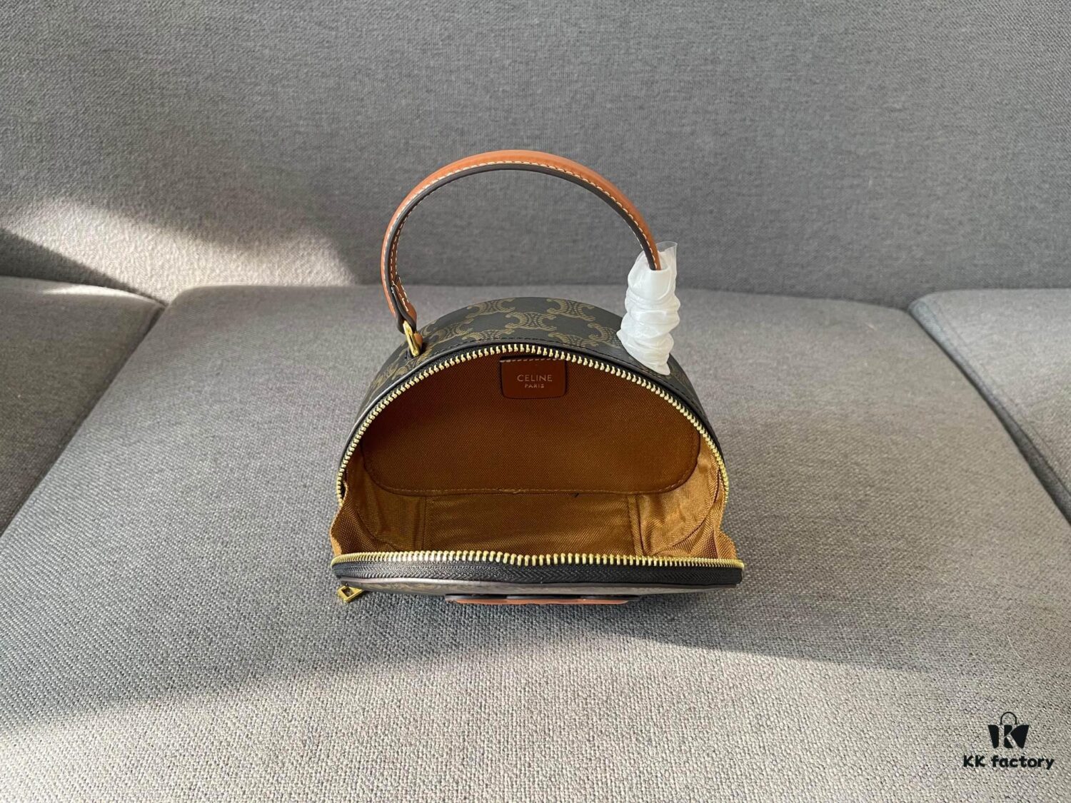 6930aca46e68136f4d9acedf Celine New Logo Print Half-Moon Mini Bag