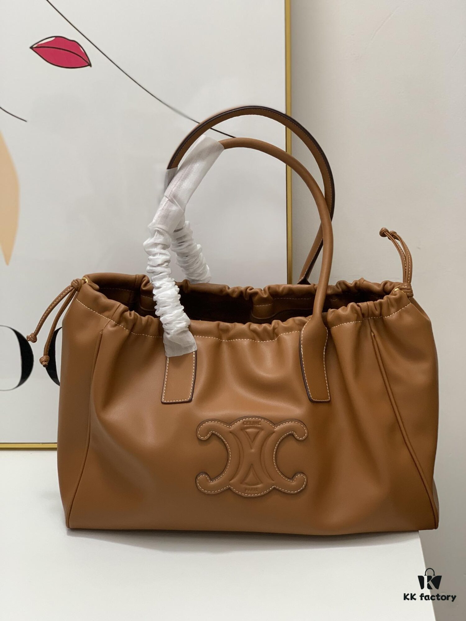 6930af316e68136f4d9ad39f Celine New Arrival Tote Bag, Calfskin Material, Arc de Triomphe Embossed Logo, Drawstring Closure at Opening, Adjustable Size