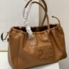 6930af326e68136f4d9ad3a1 Celine New Arrival Tote Bag, Calfskin Material, Arc de Triomphe Embossed Logo, Drawstring Closure at Opening, Adjustable Size