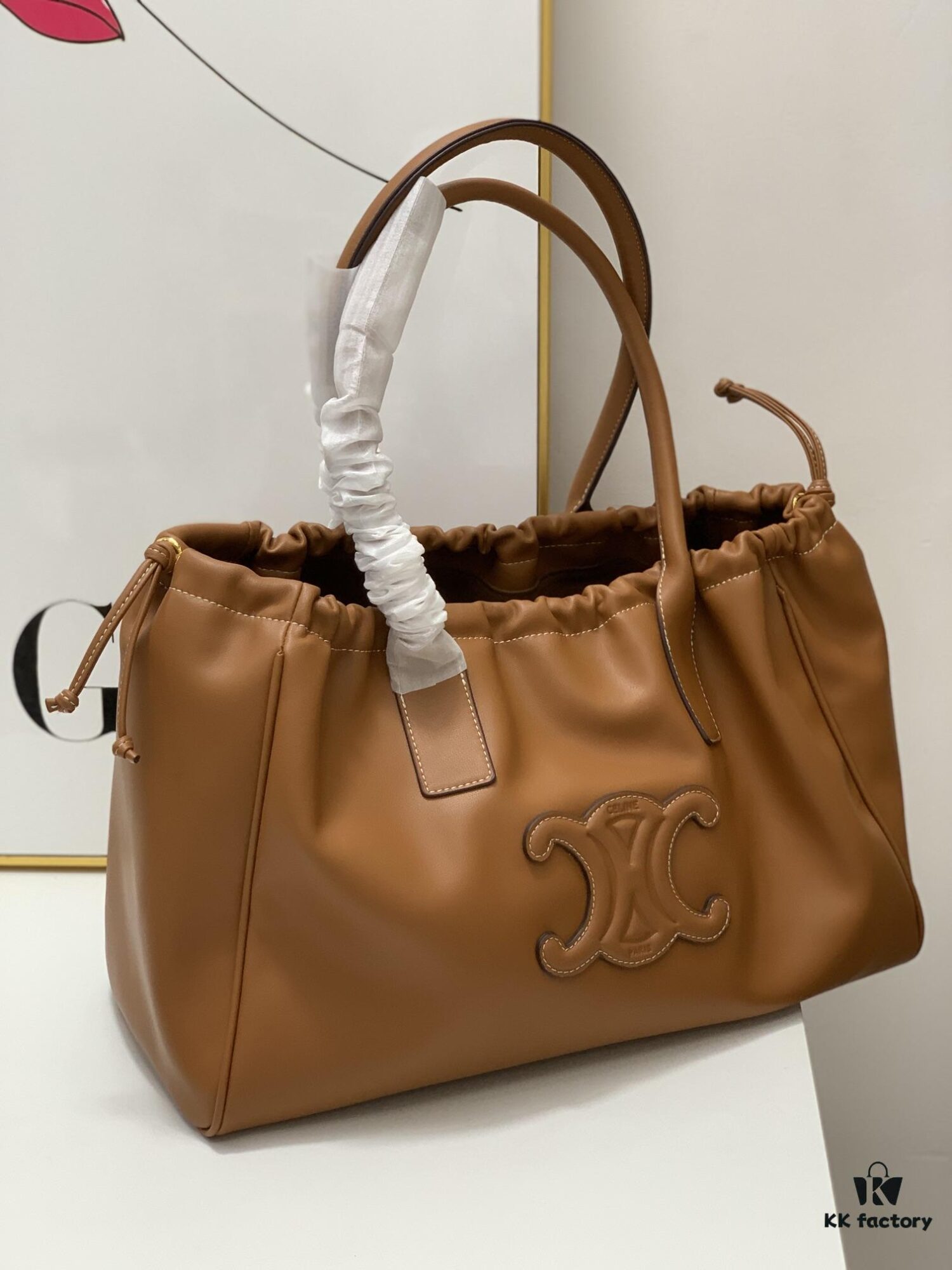 6930af326e68136f4d9ad3a1 Celine New Arrival Tote Bag, Calfskin Material, Arc de Triomphe Embossed Logo, Drawstring Closure at Opening, Adjustable Size