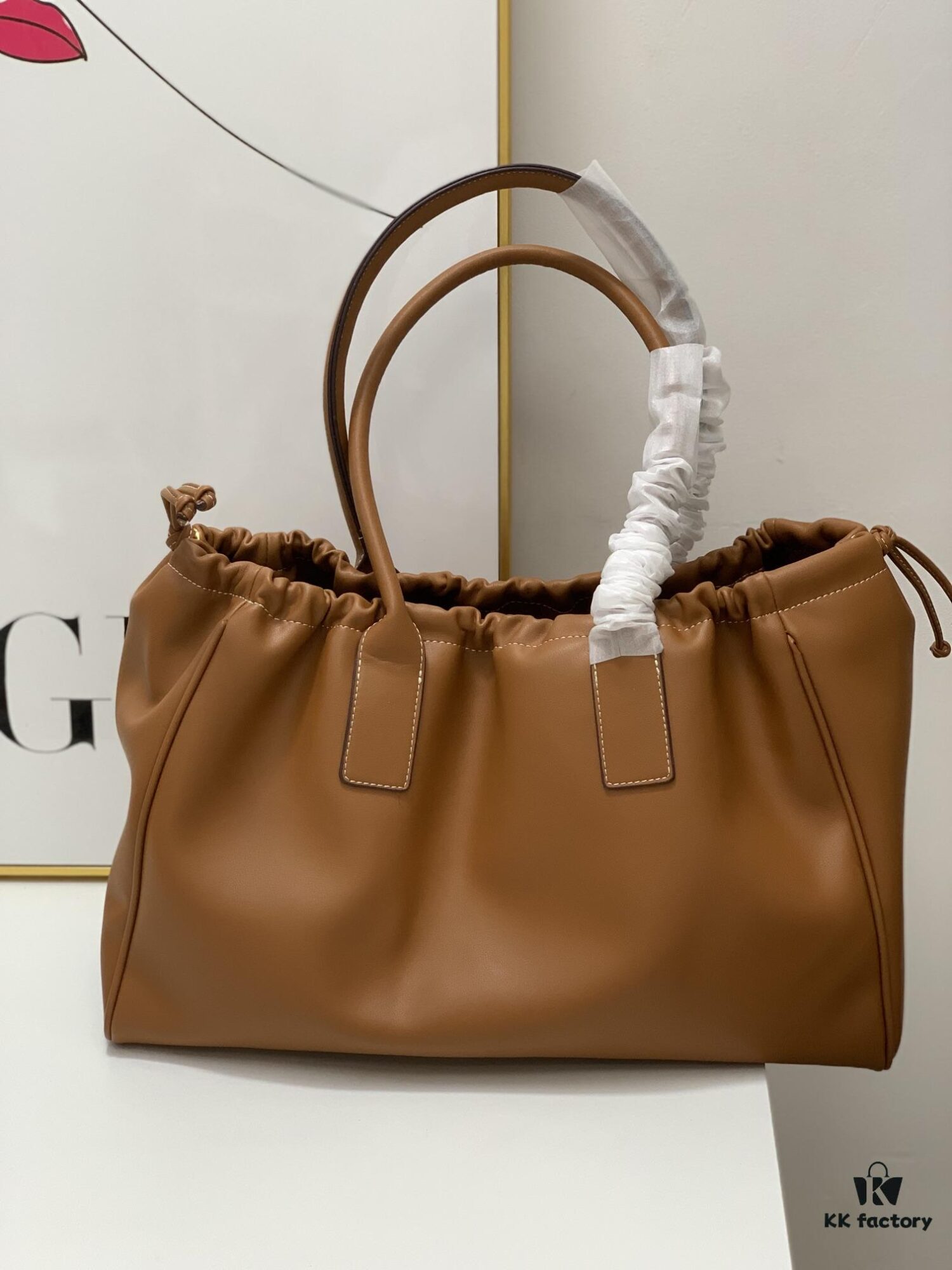6930af386e68136f4d9ad3ac Celine New Arrival Tote Bag, Calfskin Material, Arc de Triomphe Embossed Logo, Drawstring Closure at Opening, Adjustable Size