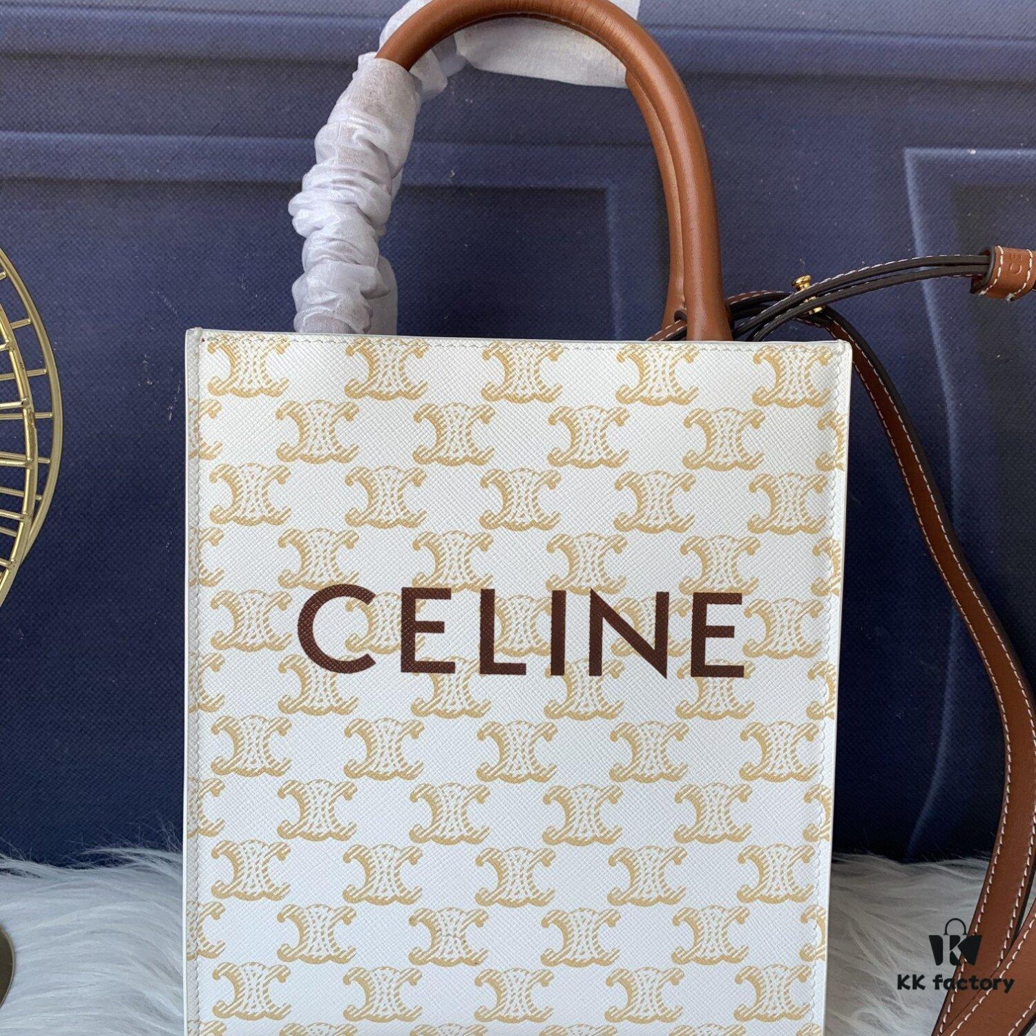 6930af856e68136f4d9ad441 Style No. C192089 Mini Apricot Small, Vertical Handbag in Soft Calfskin with Mini CELINE Print, Adjustable and Detachable Leather Shoulder Strap (50cm), Dimensions: 17cm x 21cm x 4cm