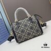 6930afb86e68136f4d9ad4ae Large TORY BURCH T Monogram Mini Jacquard Barrel Bag in Hazelnut Brown