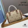6930afbb6e68136f4d9ad4b2 Large TORY BURCH T Monogram Mini Jacquard Barrel Bag in Hazelnut Brown