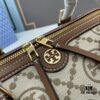 6930afbe6e68136f4d9ad4b9 Large TORY BURCH T Monogram Mini Jacquard Barrel Bag in Hazelnut Brown