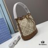 6930afcb6e68136f4d9ad4d8 Large TORY BURCH Monogram Drawstring Bucket Bag, Navy Blue Canvas with Vintage Jacquard Trim – 2021 Summer Collection