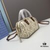 6930afd56e68136f4d9ad4ea Tory Burch T Monogram Mini Jacquard Barrel Bag in Hazelnut Brown - Small Size