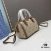 6930afd86e68136f4d9ad4f3 Tory Burch T Monogram Mini Jacquard Barrel Bag in Small, Hazel Brown