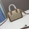 6930afda6e68136f4d9ad4f5 Tory Burch T Monogram Mini Jacquard Barrel Bag in Small, Hazel Brown