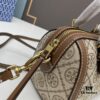 6930afda6e68136f4d9ad4f6 Tory Burch T Monogram Mini Jacquard Barrel Bag in Small, Hazel Brown