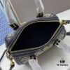 6930afdf6e68136f4d9ad4ff TORY BURCH T Monogram Mini Jacquard Barrel Bag in Hazelnut Brown