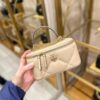 6930afeb6e68136f4d9ad518 Tory Burch New Kira Cosmetic Box Bag, Soft and Durable Calfskin with Quilted Diamond Stitching, Detachable Strap for Shoulder, Crossbody or Handheld Wear