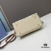 6930b0566e68136f4d9ad5d2 Tory Burch T Monogram Mini Jacquard Barrel Bag in Hazelnut Brown - Small Size