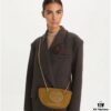 6930b07b6e68136f4d9ad616 Tory Burch Ella Small Nylon Crossbody Bag – Lightweight Recycled Nylon with Woven Chain Strap