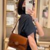 6930b10d6e68136f4d9ad714 New Arrival TORY BURCH Robinson Series Dual-Use Shoulder Bag – Spazzolato Shiny Patent Leather Messenger Bag
