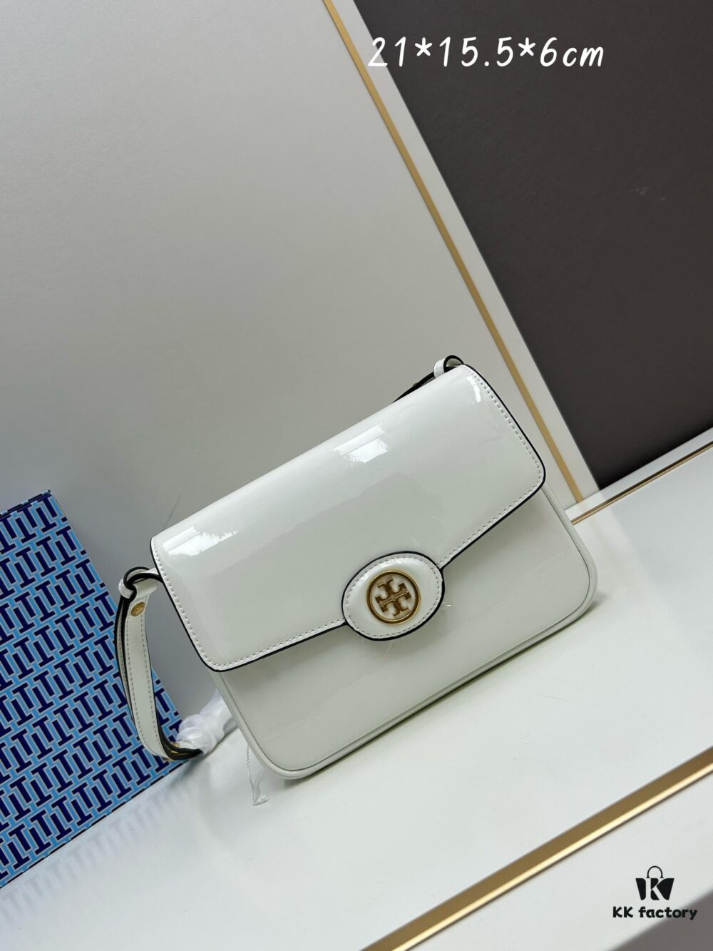 6930b12d6e68136f4d9ad746 New Arrival Robinson Series Dual-Use Shoulder Bag by Tory Burch – Sleek Spazzolato Patent Leather Messenger Bag