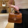 6930b1946e68136f4d9ad7f1 New TORY BURCH Robinson Series Patent Leather Motorcycle Bag – Classic Foldover Handbag with Multiple Carrying Options