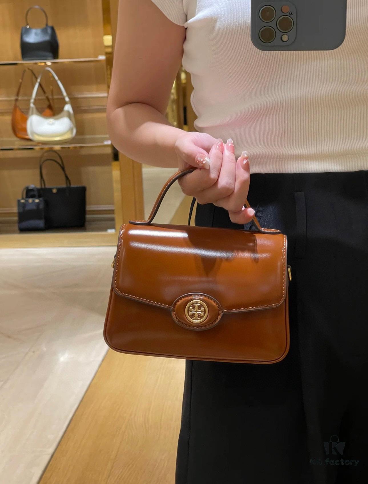 6930b1946e68136f4d9ad7f1 New TORY BURCH Robinson Series Patent Leather Motorcycle Bag – Classic Foldover Handbag with Multiple Carrying Options