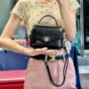 6930b1976e68136f4d9ad7f8 New TORY BURCH Robinson Series Patent Leather Motorcycle Bag – Classic Foldover Handbag with Multiple Carrying Options