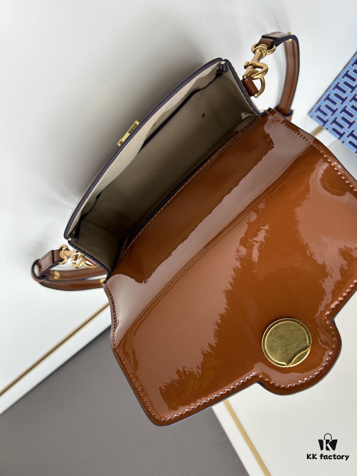 6930b1aa6e68136f4d9ad814 New TORY BURCH Robinson Series Patent Leather Motorcycle Bag – Classic Foldover Handbag with Multiple Carrying Options