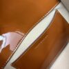 6930b1ad6e68136f4d9ad816 New TORY BURCH Robinson Series Patent Leather Motorcycle Bag – Classic Foldover Handbag with Multiple Carrying Options