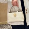 6930b1b66e68136f4d9ad827 Tory Burch Britten Series Mini Tote Bag New Arrival Pebbled Leather Ladies' Shoulder Bag