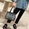6930b1dd6e68136f4d9ad86a New Arrival Attention to Detail: Tory Burch T-Monogram Tote Bag