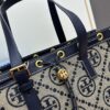 6930b1e46e68136f4d9ad875 New Arrival Attention to Detail: Tory Burch T-Monogram Tote Bag, Featuring the Classic Monogram Pattern