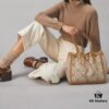 6930b1f46e68136f4d9ad88d New Arrival Attention to Detail: Tory Burch T-Monogram Tote Bag