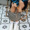 6930b24b6e68136f4d9ad922 Tory Burch Classic Series, New Moon Bag with Signature T-Monogram Pattern