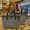 6930b2586e68136f4d9ad939 Tory Burch Large Monogram Shopping Tote Bag