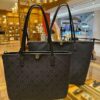6930b2596e68136f4d9ad93c Tory Burch Large Monogram Shopping Tote Bag