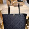 6930b25a6e68136f4d9ad93d Tory Burch Large Monogram Shopping Tote Bag