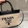 6930b33b6e68136f4d9ada99 Prada Rattan Bag