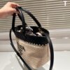 6930b33d6e68136f4d9ada9a Prada Rattan Bag