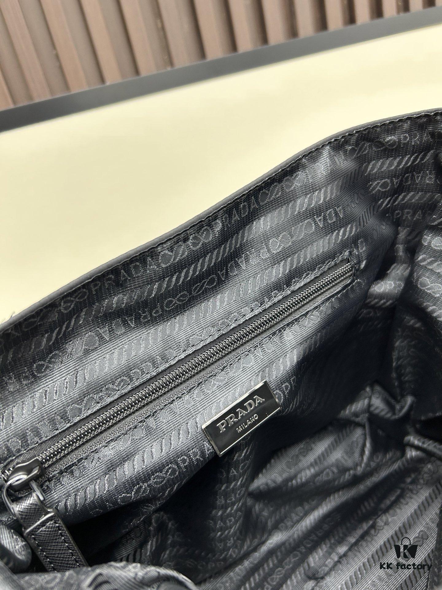 6930b3616e68136f4d9adac7 Prada RE-NYLON Recycled Nylon and Saffiano Leather Shoulder Bag! Crossbody Messenger Bag, Unisex! Parachute Fabric with Crosshatch Calfskin, Zippered Compartment at Back, Another Zippered Pocket on the Flap! Two Snap Closures at the Opening for Security and Practicality! Adjustable Shoulder Strap! Size 30 x 25 cm, Model 2387