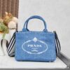 6930b3dd6e68136f4d9adb6a Who Could Resist a Prada Beach Bag?