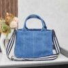6930b3dd6e68136f4d9adb6b Who Could Resist a Prada Beach Bag?