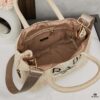 6930b3f06e68136f4d9adb83 Prada Beautiful Wicker Basket Bag, Embrace the Summer with the Prada Rattan and Leather Tote