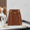 6930b4656e68136f4d9adc5a Vintage Prada Suede Crossbody Bag with Chain – A Timeless 'Baozi' Design