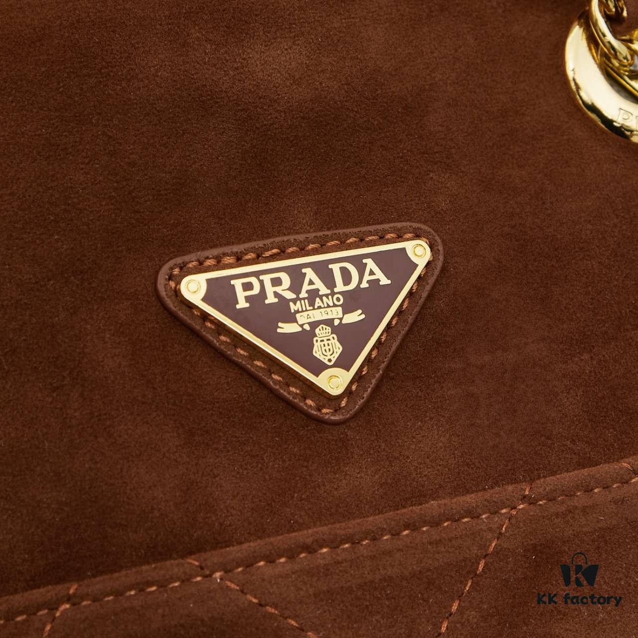6930b4686e68136f4d9adc60 Vintage Prada Suede Crossbody Bag with Chain – A Timeless 'Baozi' Design