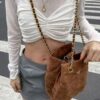 6930b4746e68136f4d9adc7b Vintage Prada Suede Crossbody Bag with Chain – A Timeless 'Baozi' Design, Opens as a Long-Chain Tote