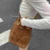 6930b4786e68136f4d9adc7f Vintage Prada Suede Crossbody Bag with Chain – A Timeless 'Baozi' Design, Opens as a Long-Chain Tote