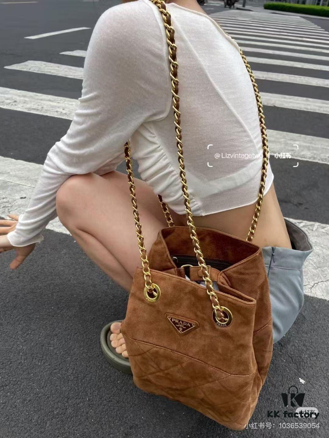 6930b47a6e68136f4d9adc82 Vintage Prada Suede Crossbody Bag with Chain – A Timeless 'Baozi' Design, Opens as a Long-Chain Tote